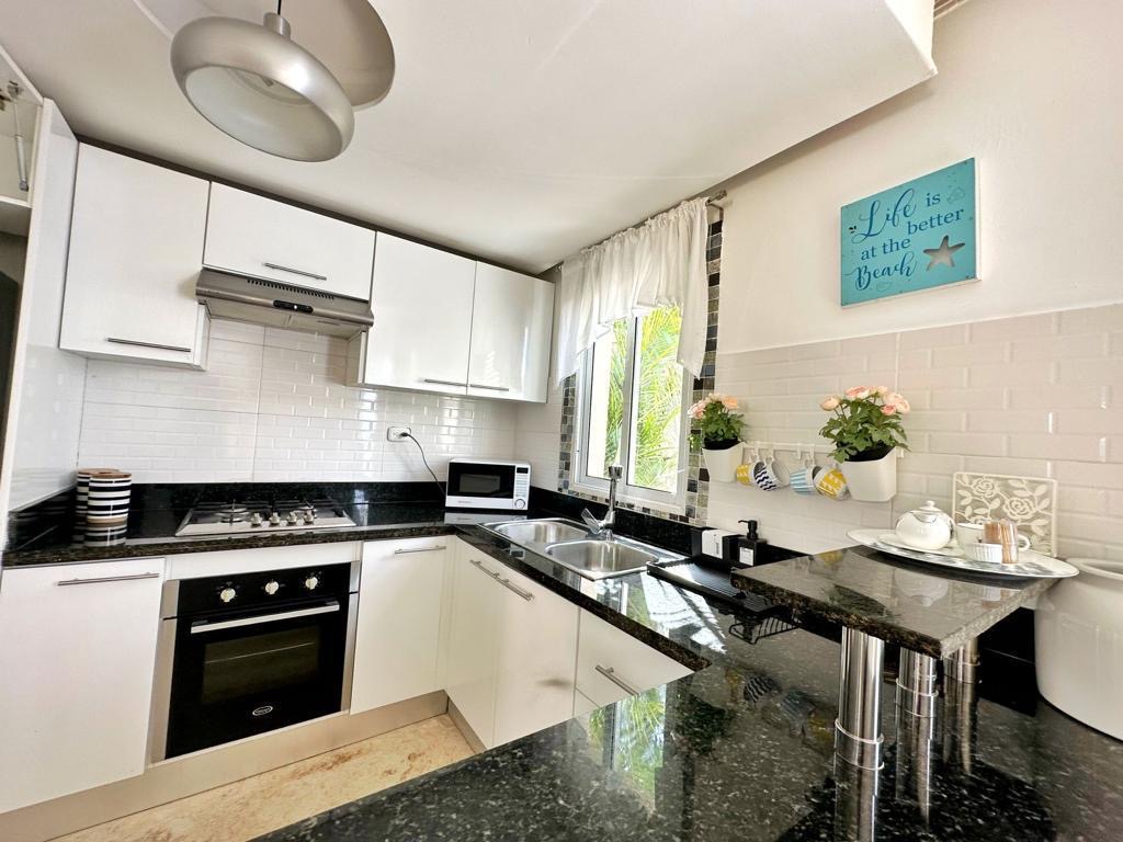 Covered parking with slate stone flooring — Punta Cana villa for sale, Dominican Republic real estate