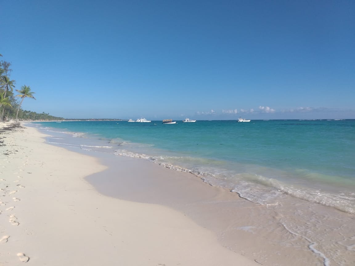 Crystal-clear turquoise Caribbean Sea with white sand — beach near Punta Cana villa for sale, Dominican Republic